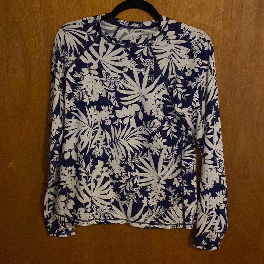 Navy and white floral swim shirt. SPF 50. Never worn!